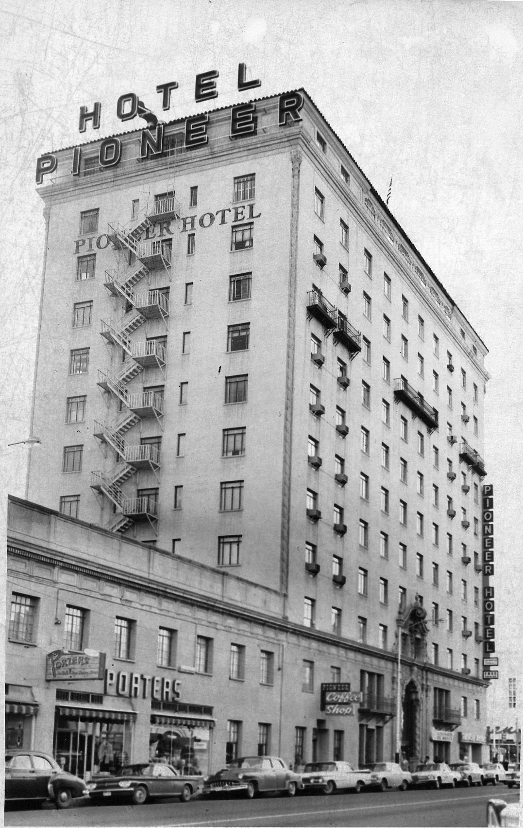 Walking past the Pioneer Hotel downtown